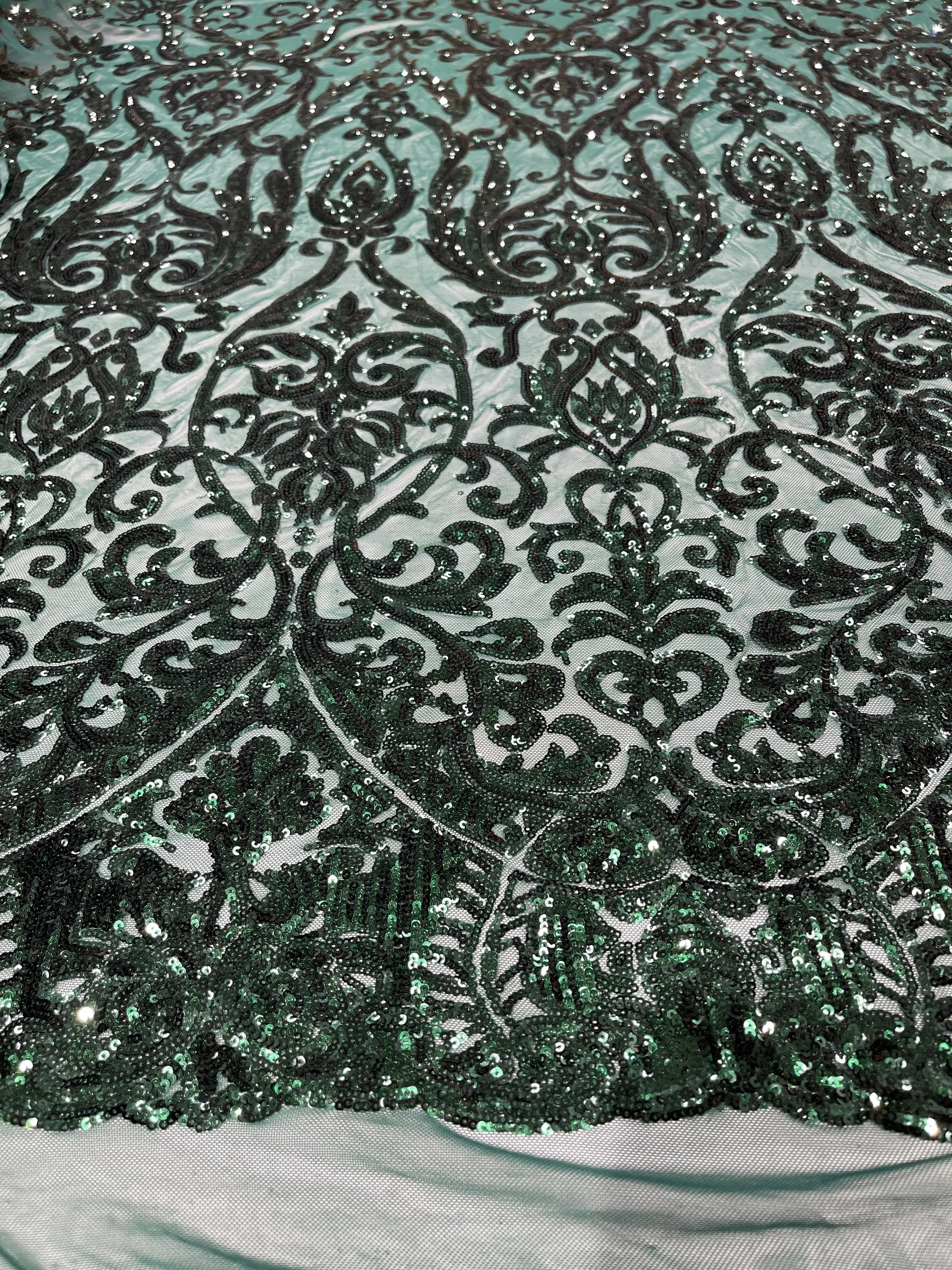 Hunter Green shiny sequin damask design on a 4 way stretch mesh- sold by the yard.